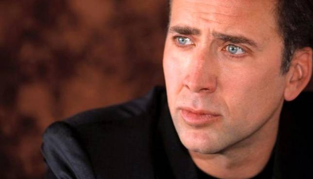 Nicolas Cage once awoke to a naked man wearing a leather jacket 

eating a Fudgesicle in front of his bed, in his Orange County house. 

Cage couldn't live in that house again and moved to the Bahamas.