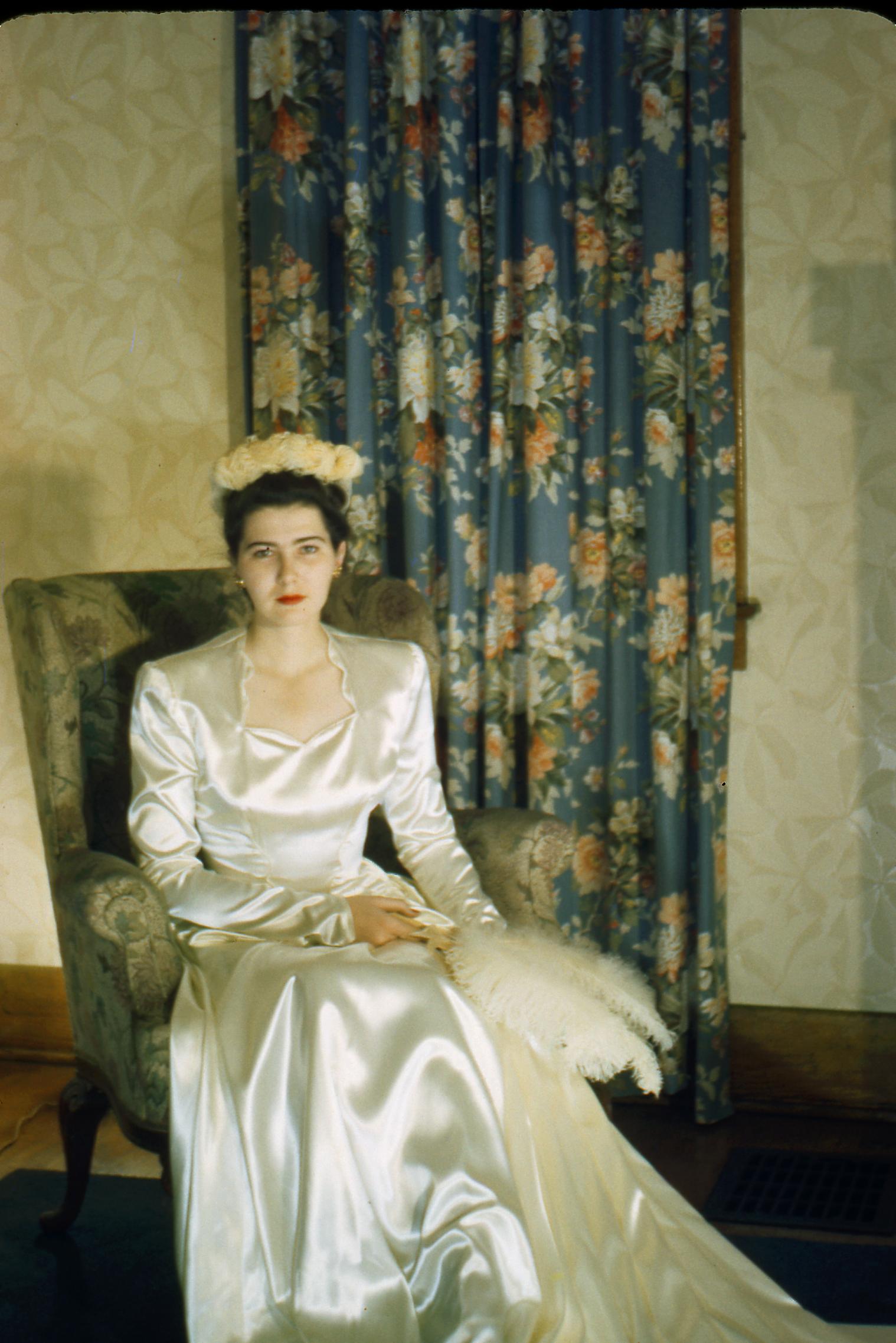 Woman wearing her wedding dress, 1943.