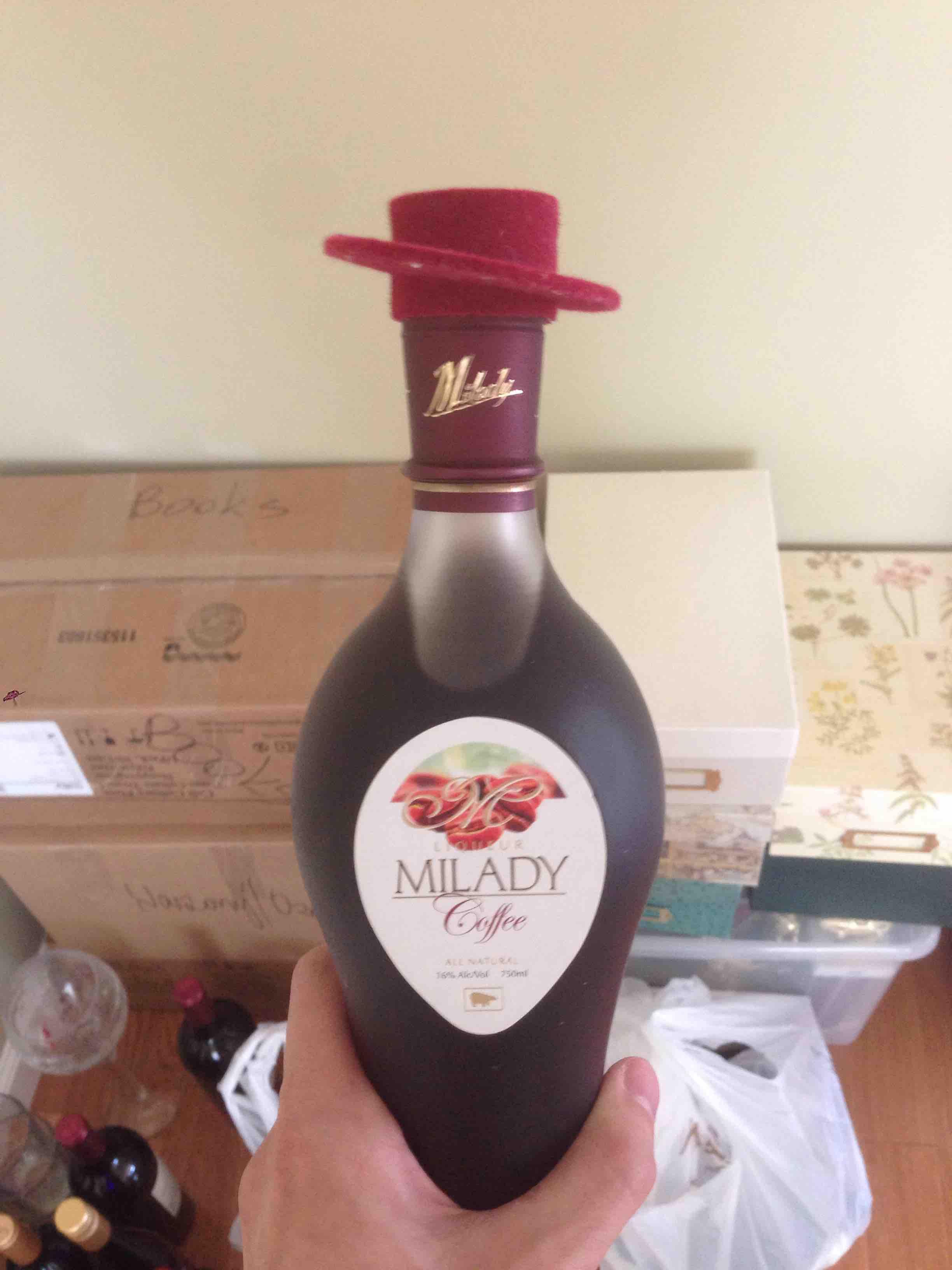 This alcohol pronounced like "m'lady" is wearing a fedora.