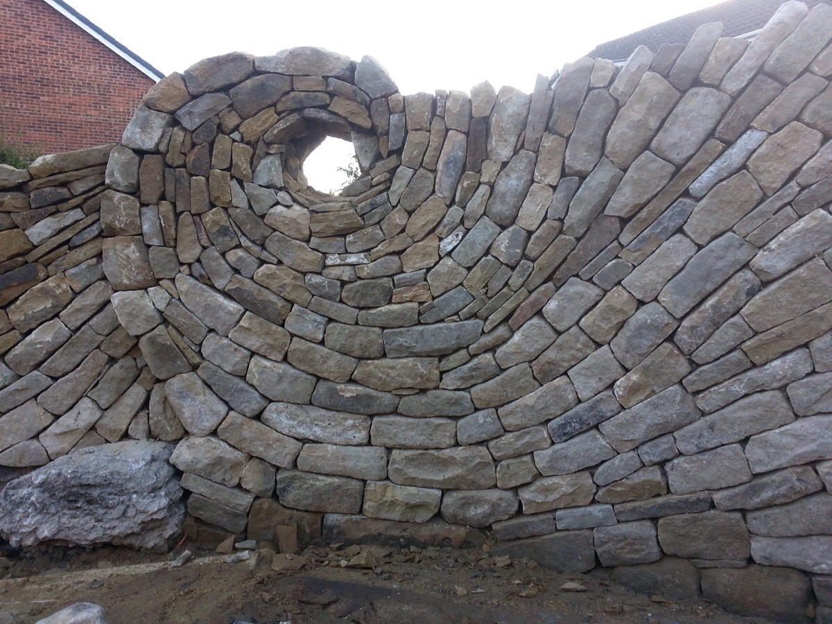 oddly satisfying - spiral stone wall