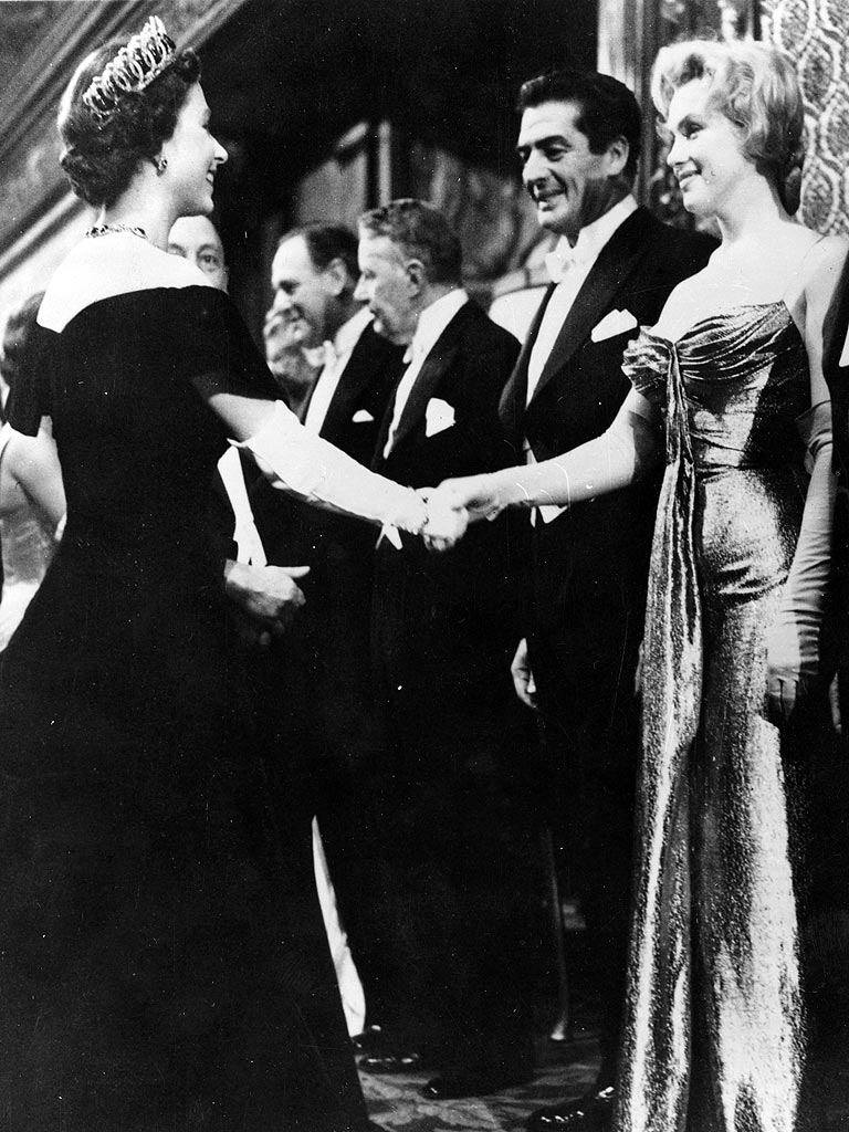 Marilyn Monroe meeting Queen Elizabeth II in 1956 - Both 30 years old.