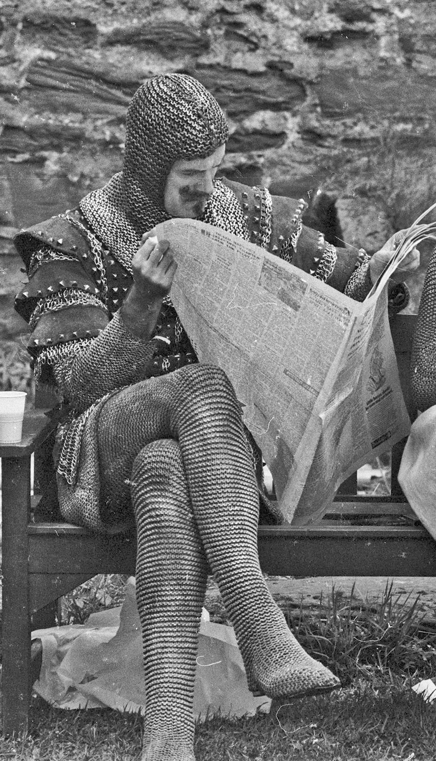 John Cleese taking a break on the set of Monty Python and The Holy Grail, 1974.