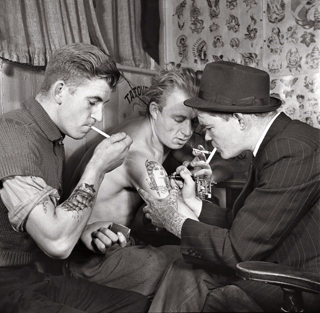 Getting a tattoo in 1942.