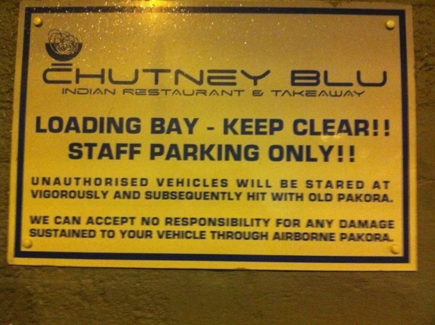 sign - Ehutney Blu Indian Restaurante Tareaway Loading Bay Keep Clear!! Staff Parking Only!! Unauthorised Vehicles Will Be Stared At Vigorously And Subsequently Hit With Old Pakora We Can Accept No Responsibility For Any Damage Sustained To Your Vehicle T
