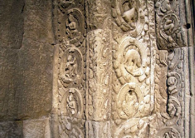 This carved facade can be seen in the temples of Ta Prohm, in Cambodia. It is from the 11th century AD. That's clearly a stegosaurus carved onto it.  How is it possible people knew of them if they went extinct millions of years ago, and were discovered centuries after the temple was built?