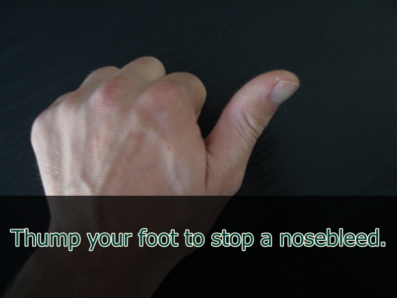 hand model - Thump your foot to stop a nosebleed.