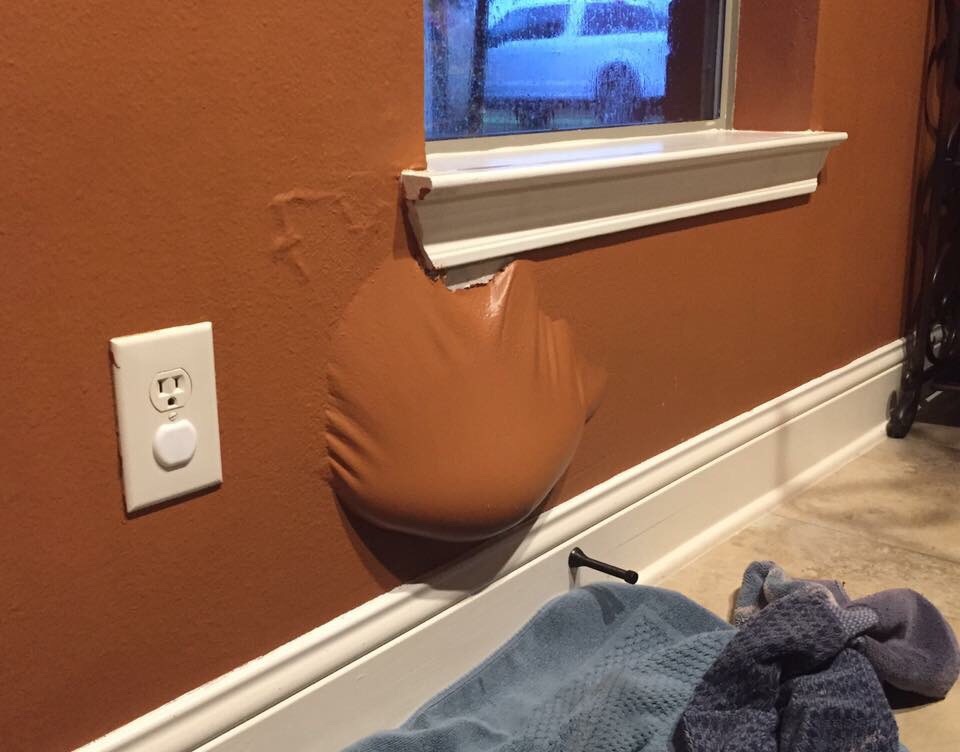 Water trapped inside house paint.