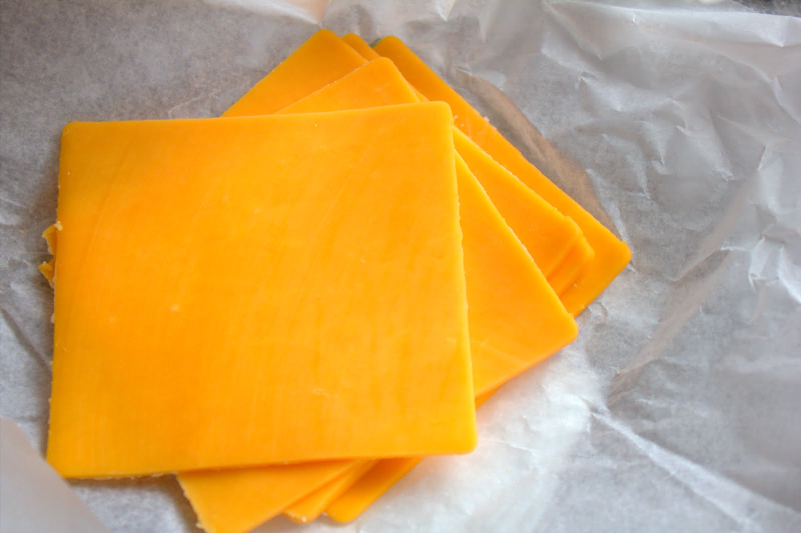 The fast food cheese is not 100% cheese, in fact it's less than half that. Around 49% of this "cheese" consists of additives, chemicals and flavoring.