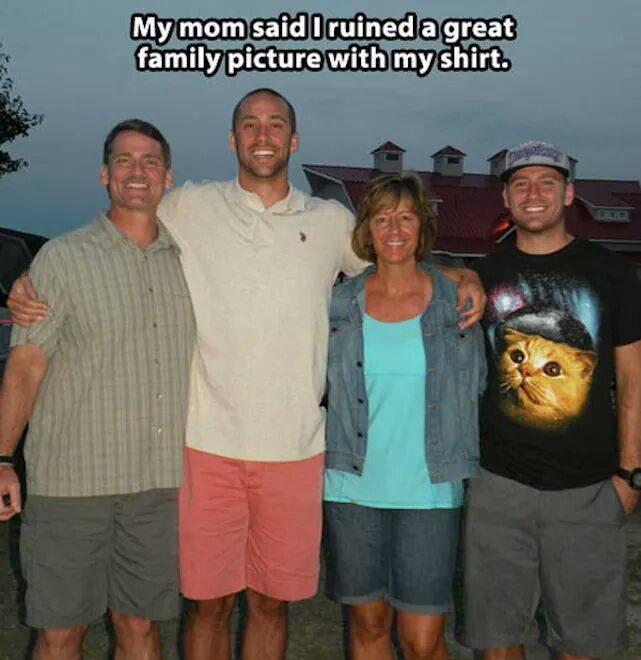 Laughter - My mom said I ruined a great family picture with my shirt.