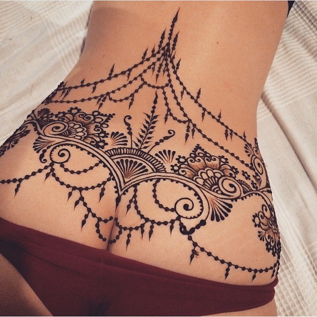 mandala lower back tattoo - 200