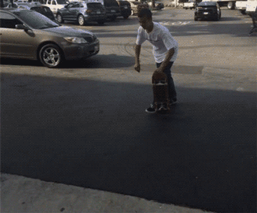 running with skateboard gif