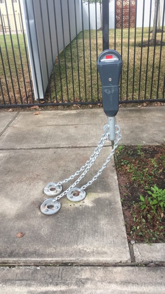 An anchored parking meter.