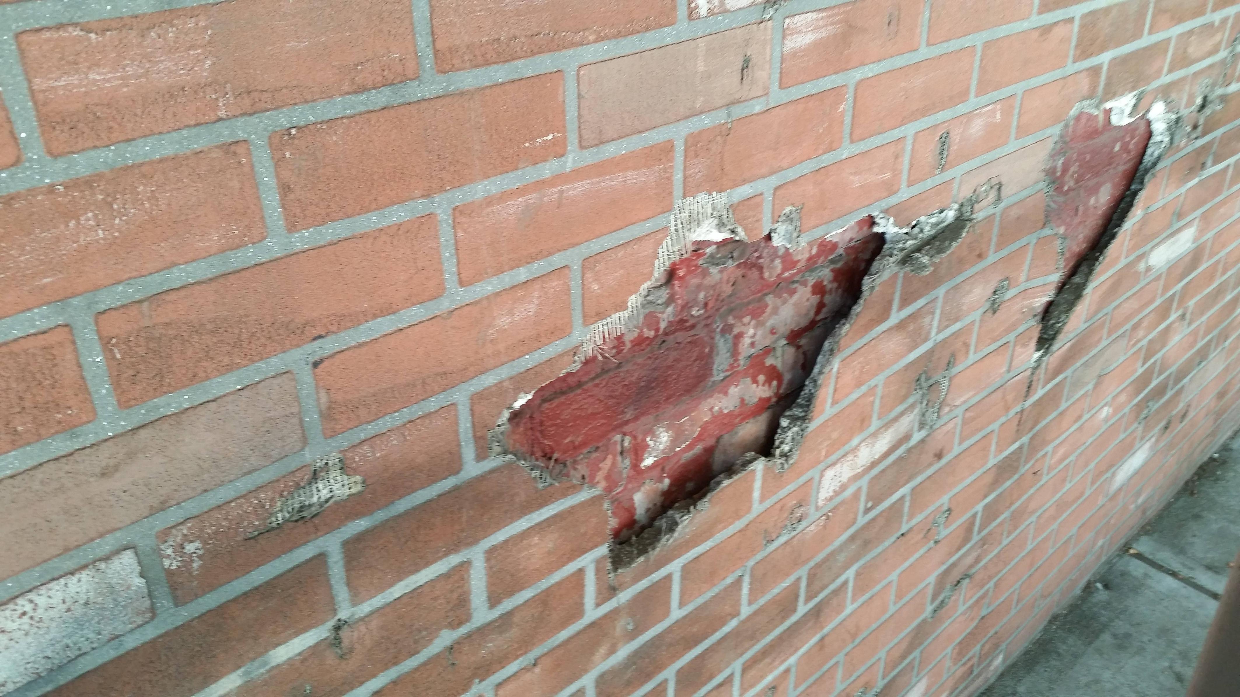 They covered real brick with fake brick.