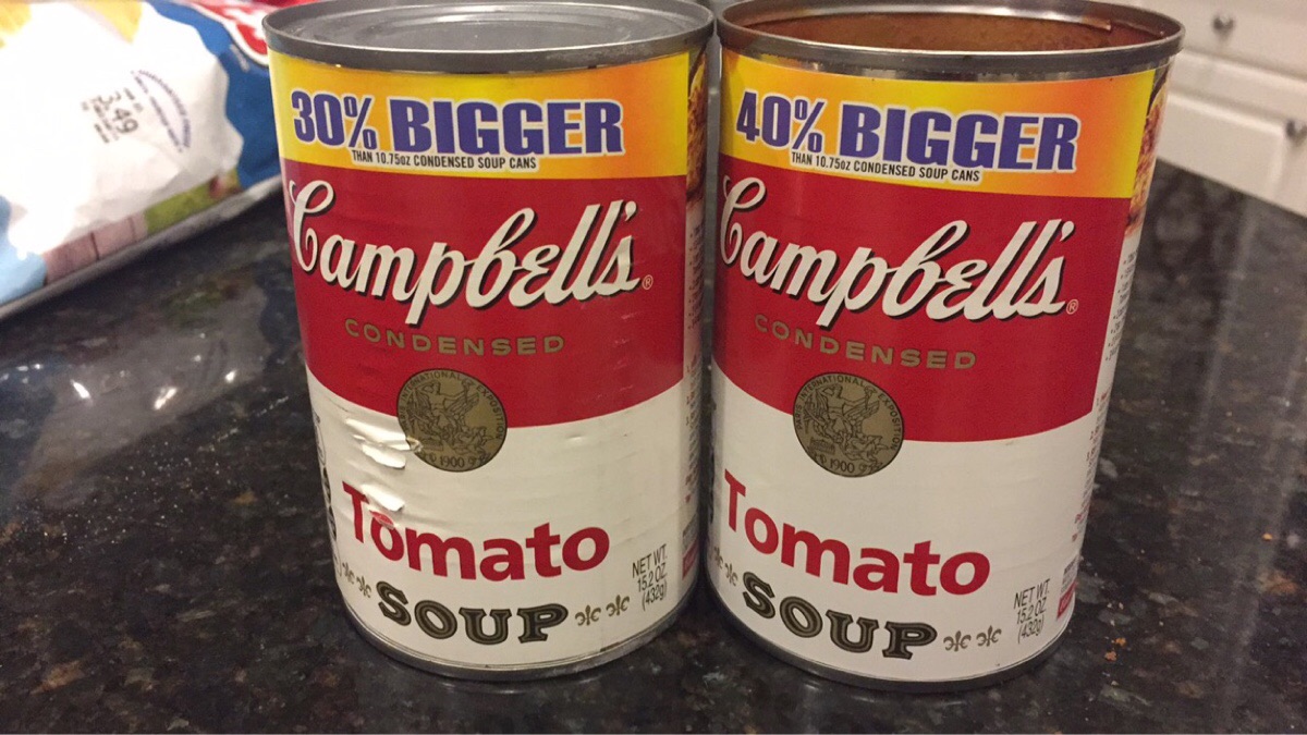 These soup cans are the same size, but one says it's bigger.