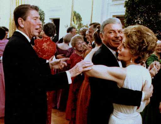Frank Sinatra being told by the President to stop dancing with the First 

Lady, Nancy Reagan.