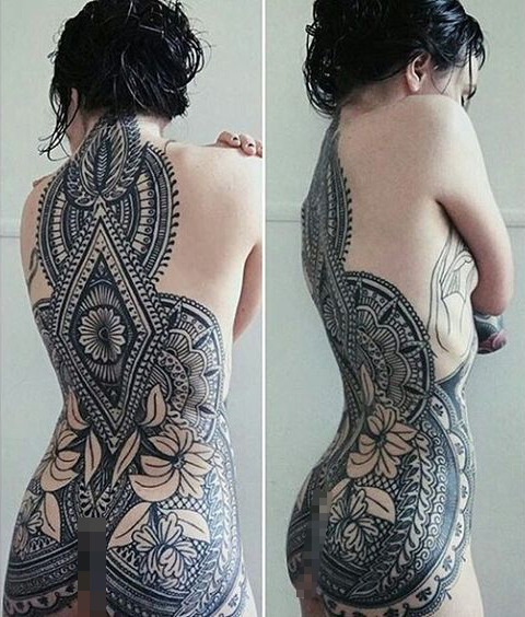 geometric back piece tattoo