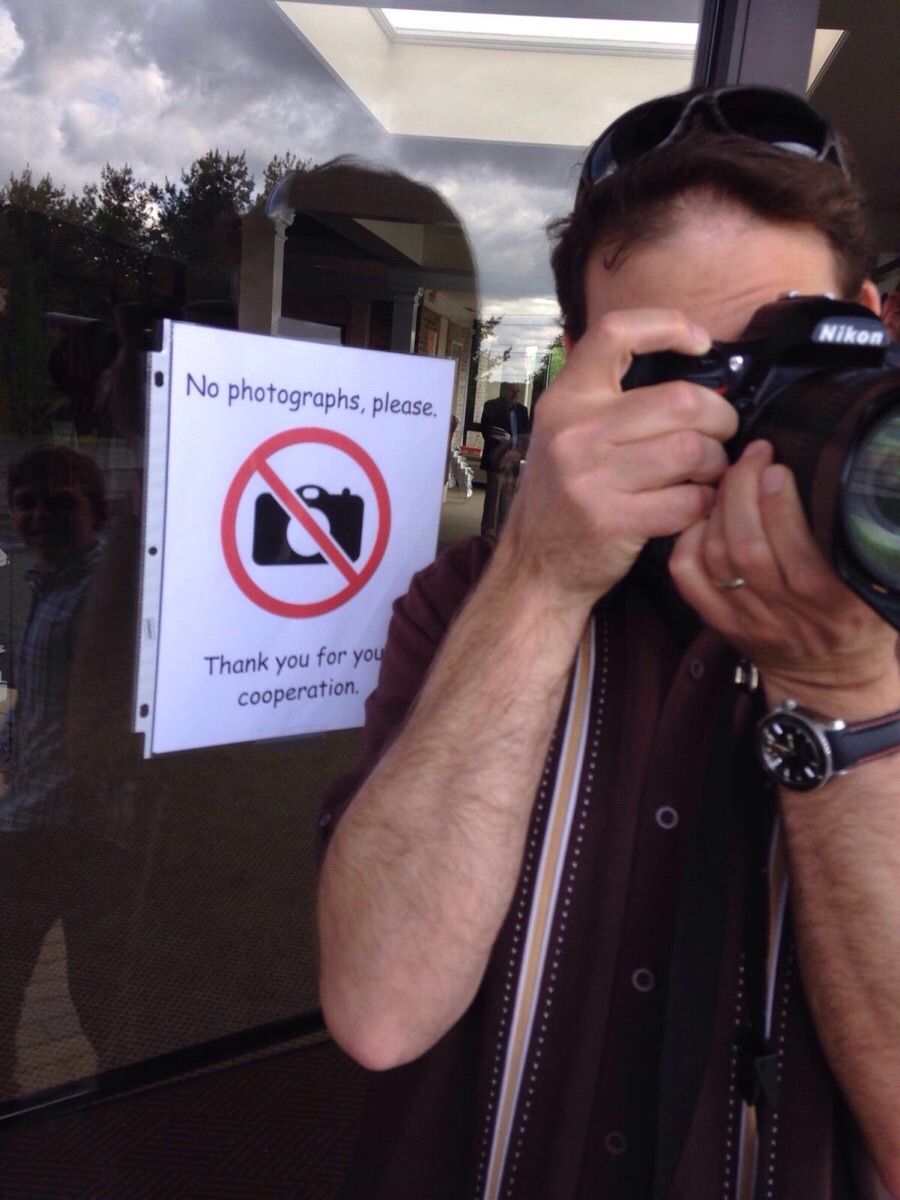 photojournalist - Nikon No photographs, please. Thank you for you cooperation