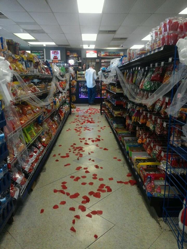 Nothing says dream wedding quite like cloth rose petals scattered on a dirty floor.