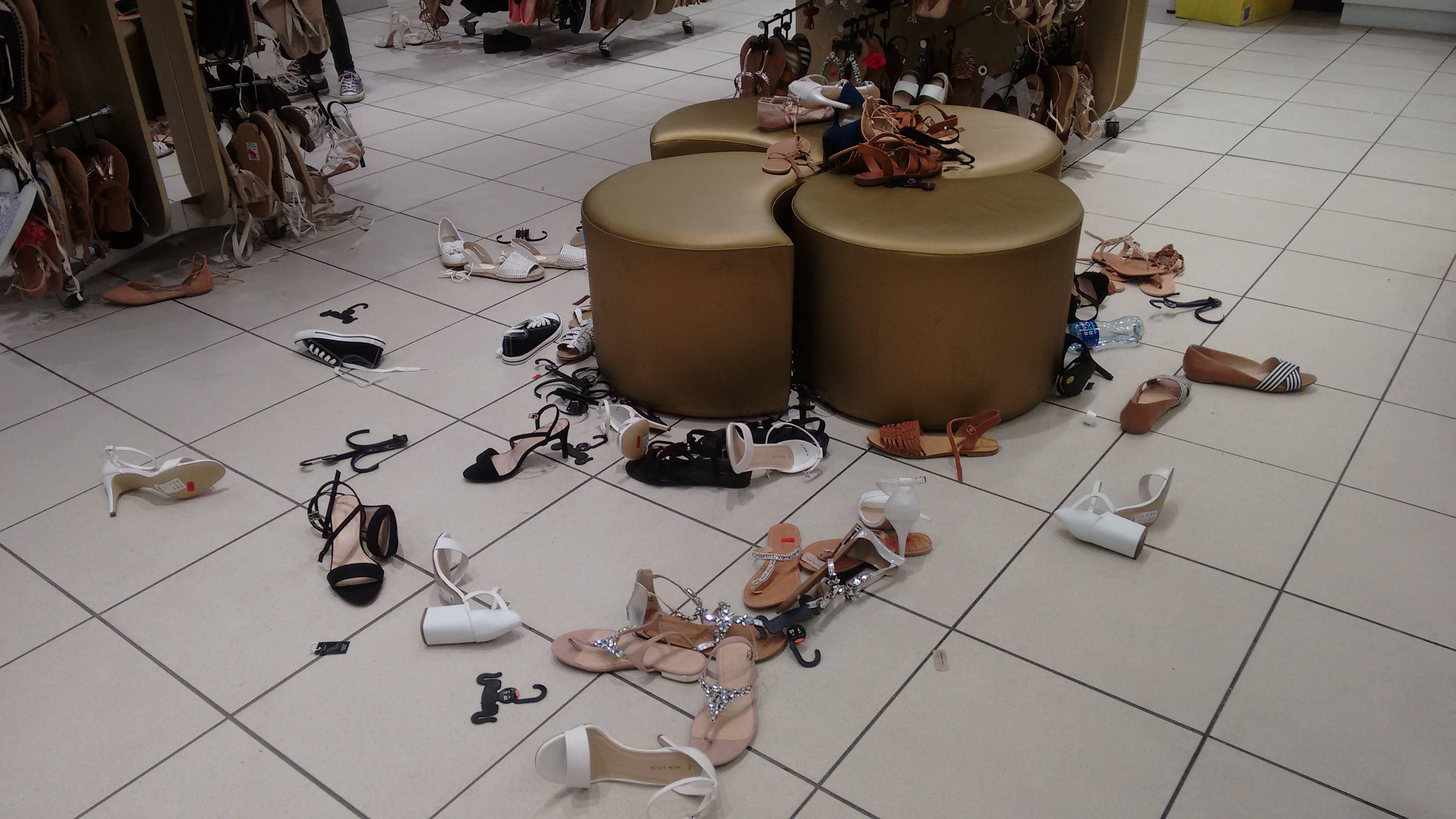 Mess of woman's shoes on the floor