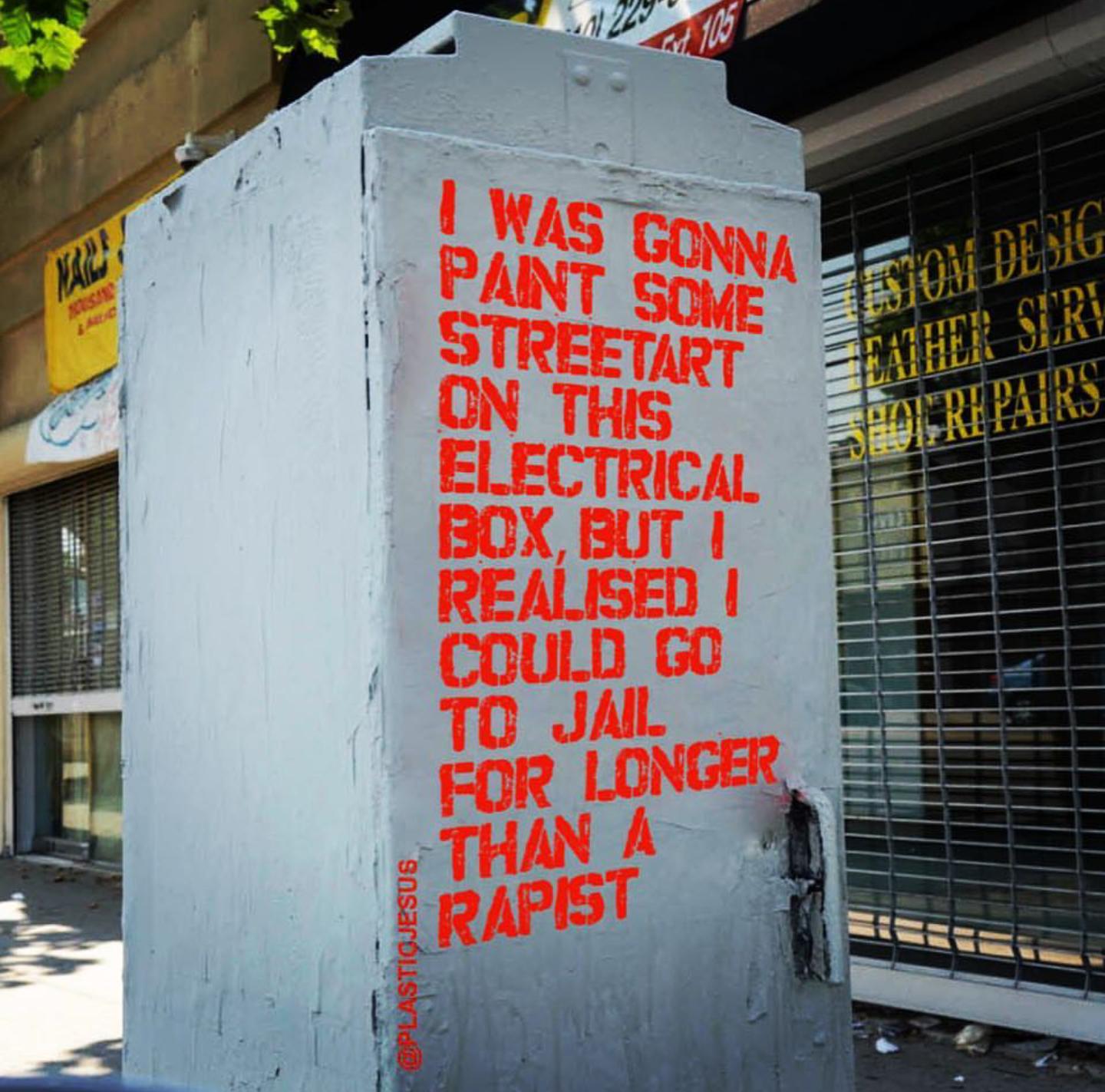 Stenciled letters onto a street electrical box pointing out that graffiti artists go longer to jail than some rapists.