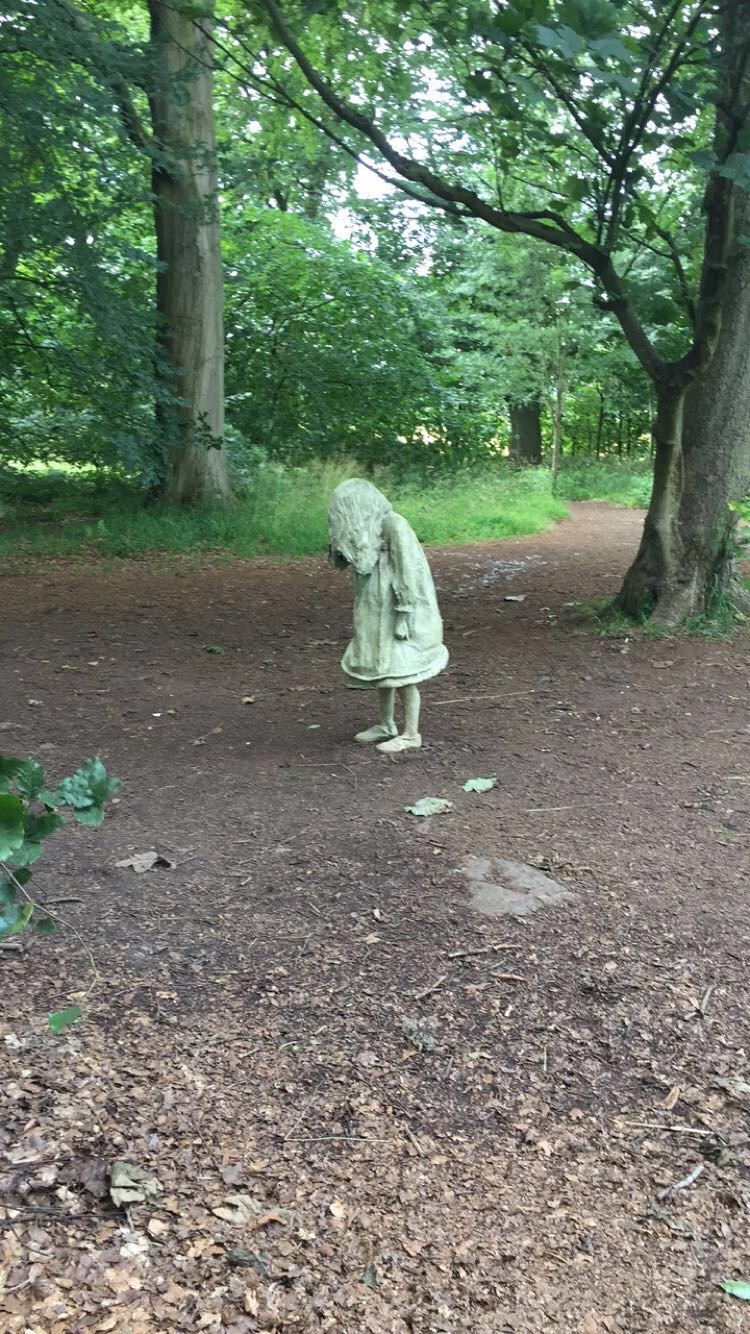 statue girl creepy