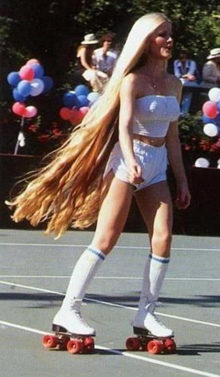 Incredibly long-haired roller girl, 1970s.