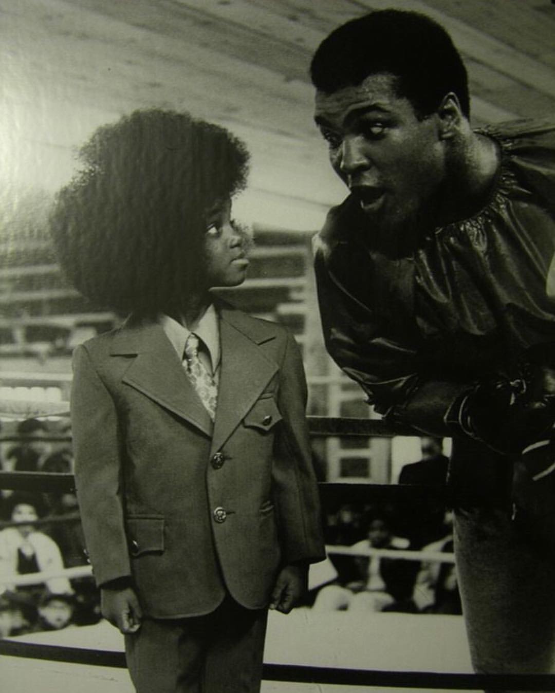 Muhammad Ali with little Michael Jackson, 1960s.