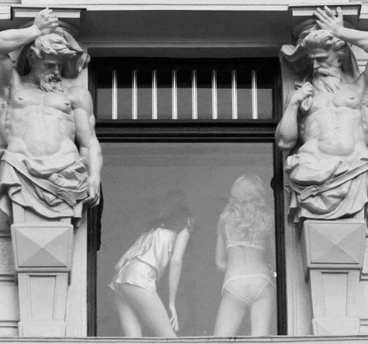 Funny picture of God statues checking out those girls