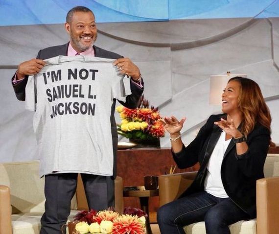 funny picture of Lawrence Fishburne holding up a t-shirt that says I'M NOT SAMUEL L. JACKSON