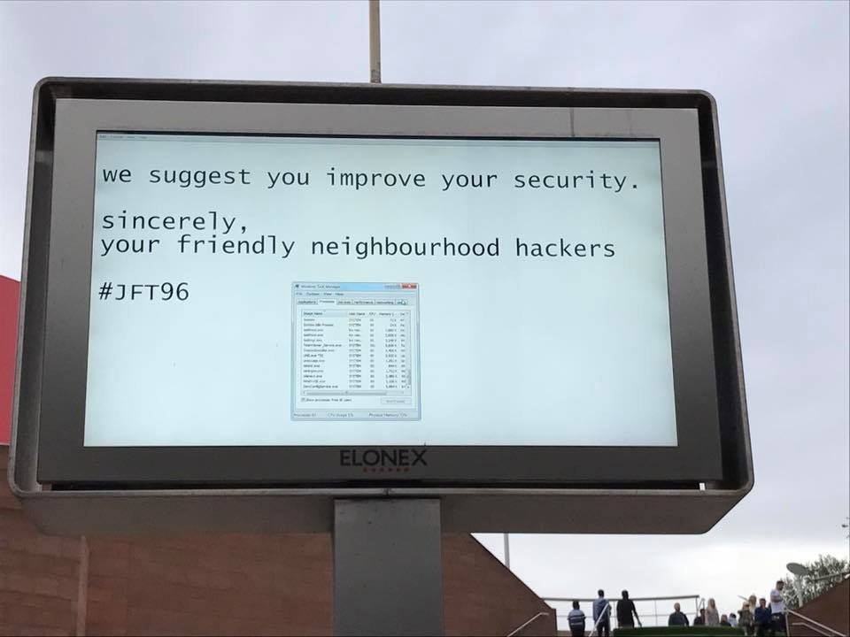 electronic billboard hacked - we suggest you improve your security. sincerely, your friendly neighbourhood hackers Elonex