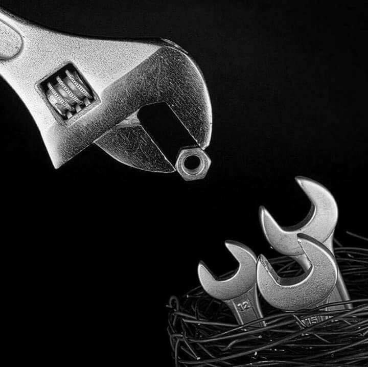 cool pic of a wrench about to feed a bolt to the baby wrenches.
