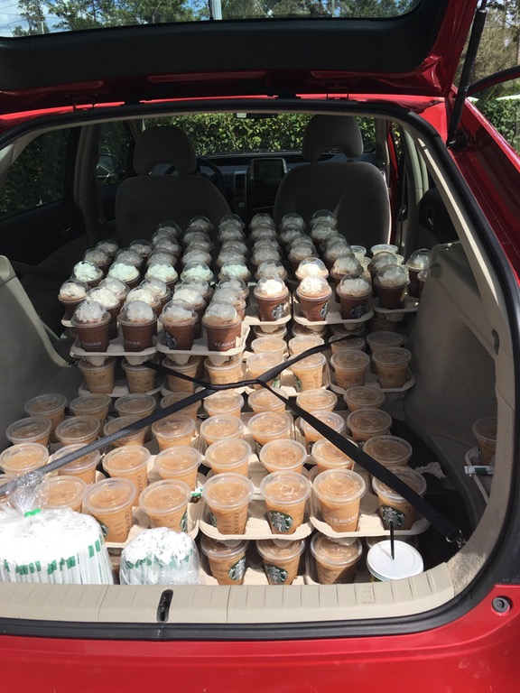 SUV with a whole lotta Starbucks in the trunk.