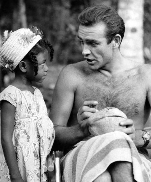 Sean Connery signs a Coconut for a young Jamaican girl - 1960s
