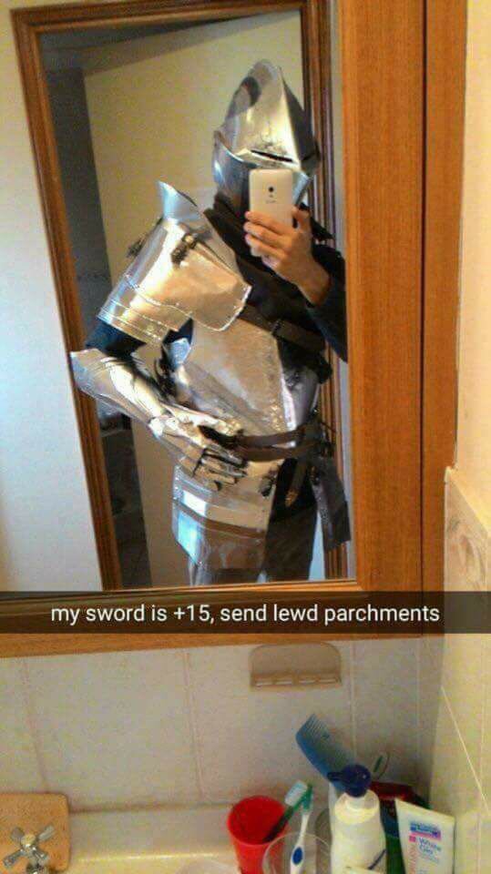 Man in knight outfit sending a snapchat