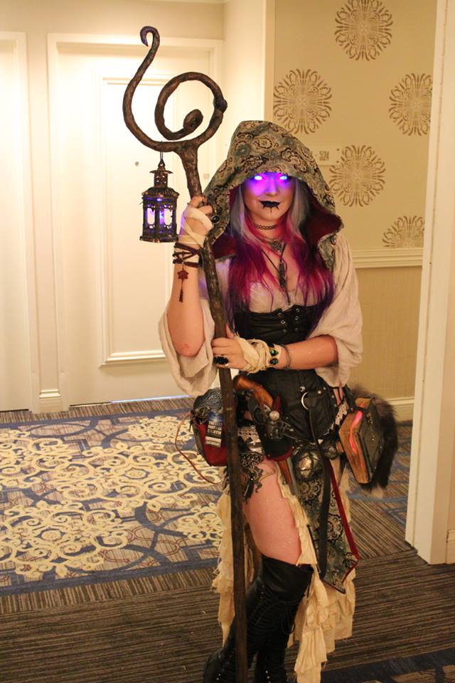 Cosplay done well with purple glowing eyes.