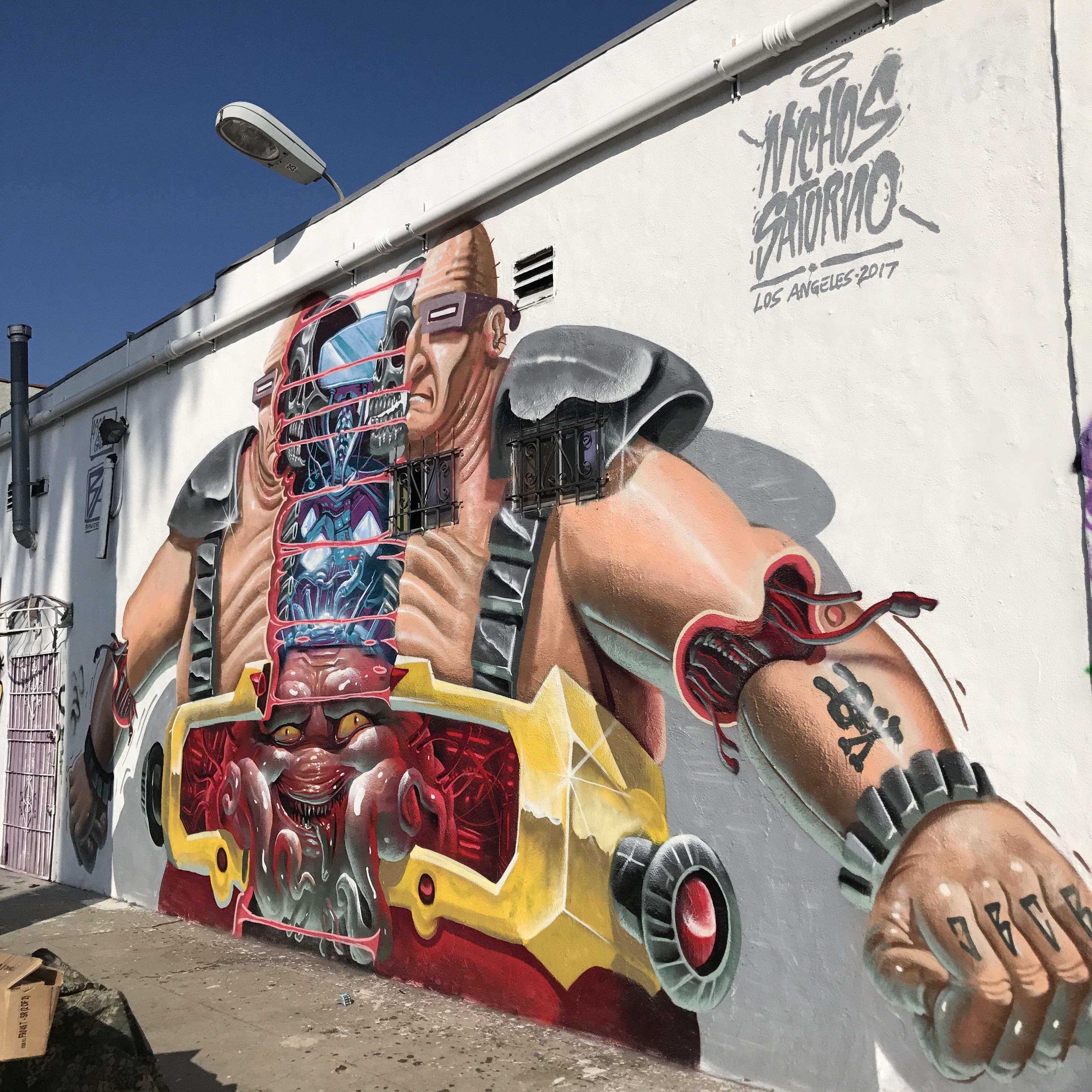 Awesome artwork of cyborg on a side of a truck