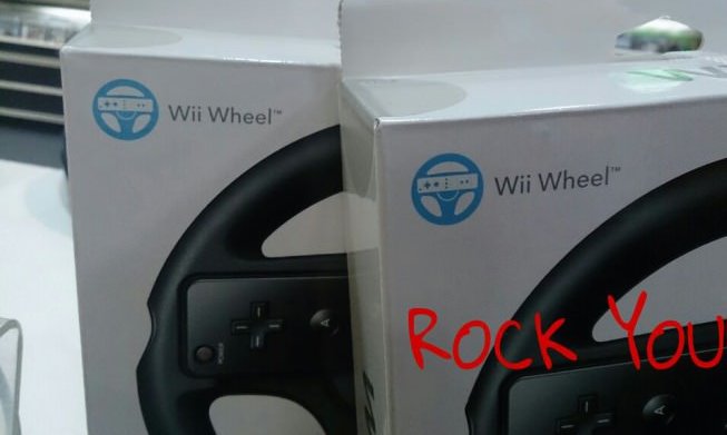 two Wii Wheels and the word rock you.
