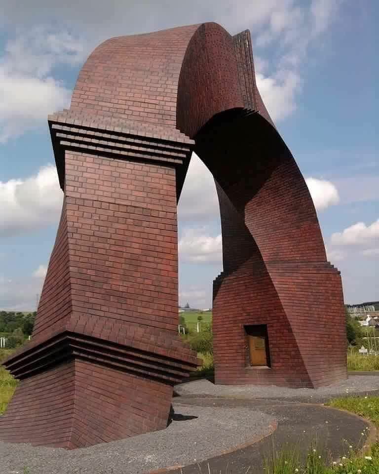 Warped brick sculpture like a mobius strip