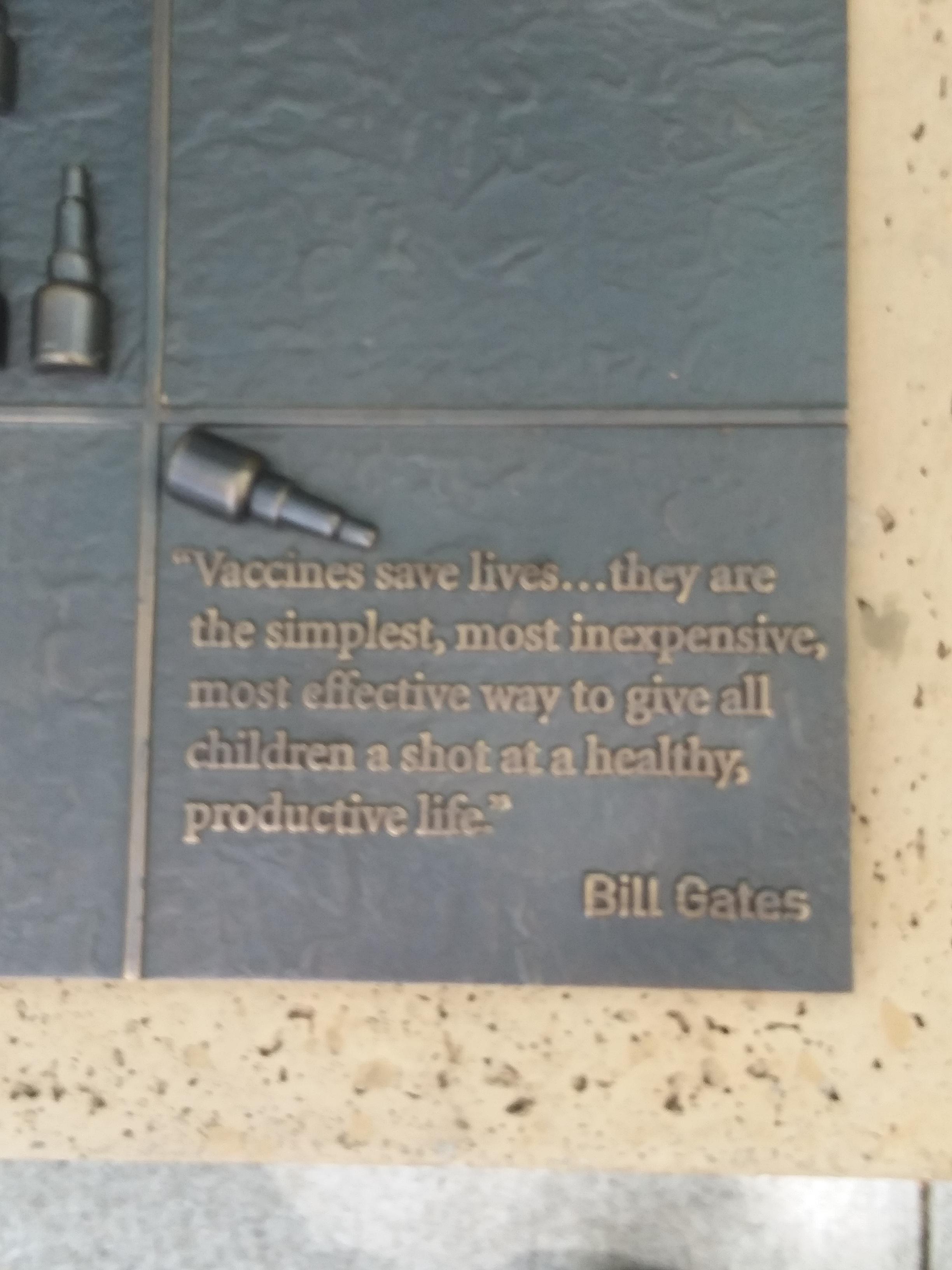 Metal engraved quote by Bill Gates on the utility of vaccines