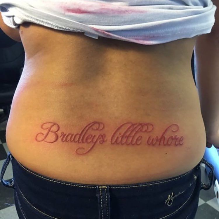 Girl that has "Bradley's little whore" tattooed on her back.