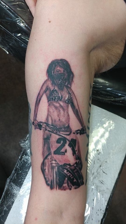 horrible tattoo on the arm