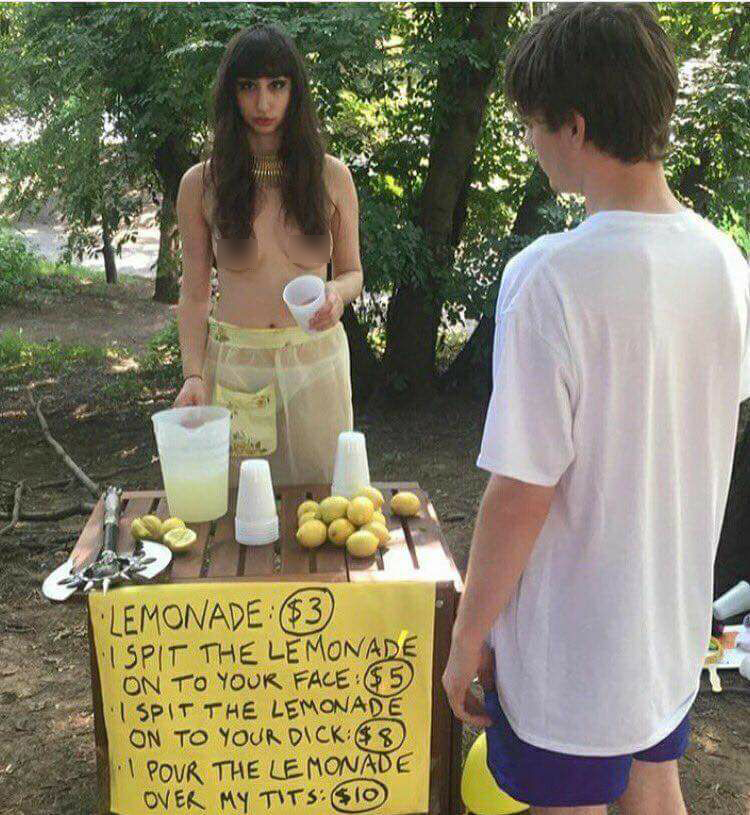 Amusing picture of goth woman who opened up a lemonade stand.
