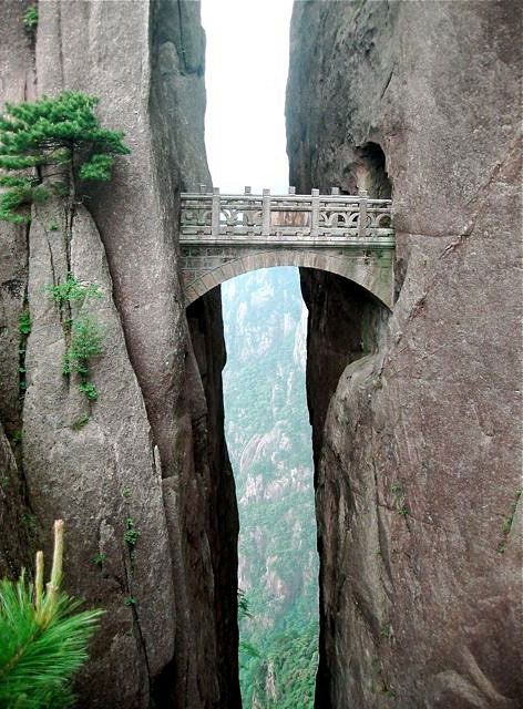 Cute bridge between two massive rocks.