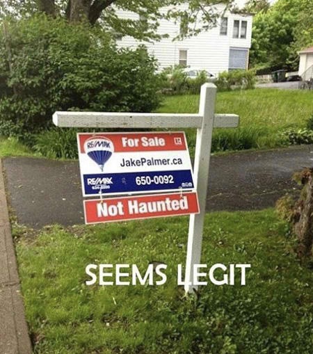 Funny picture of house that is for sale that says on it NOT HAUNTED which seems legit