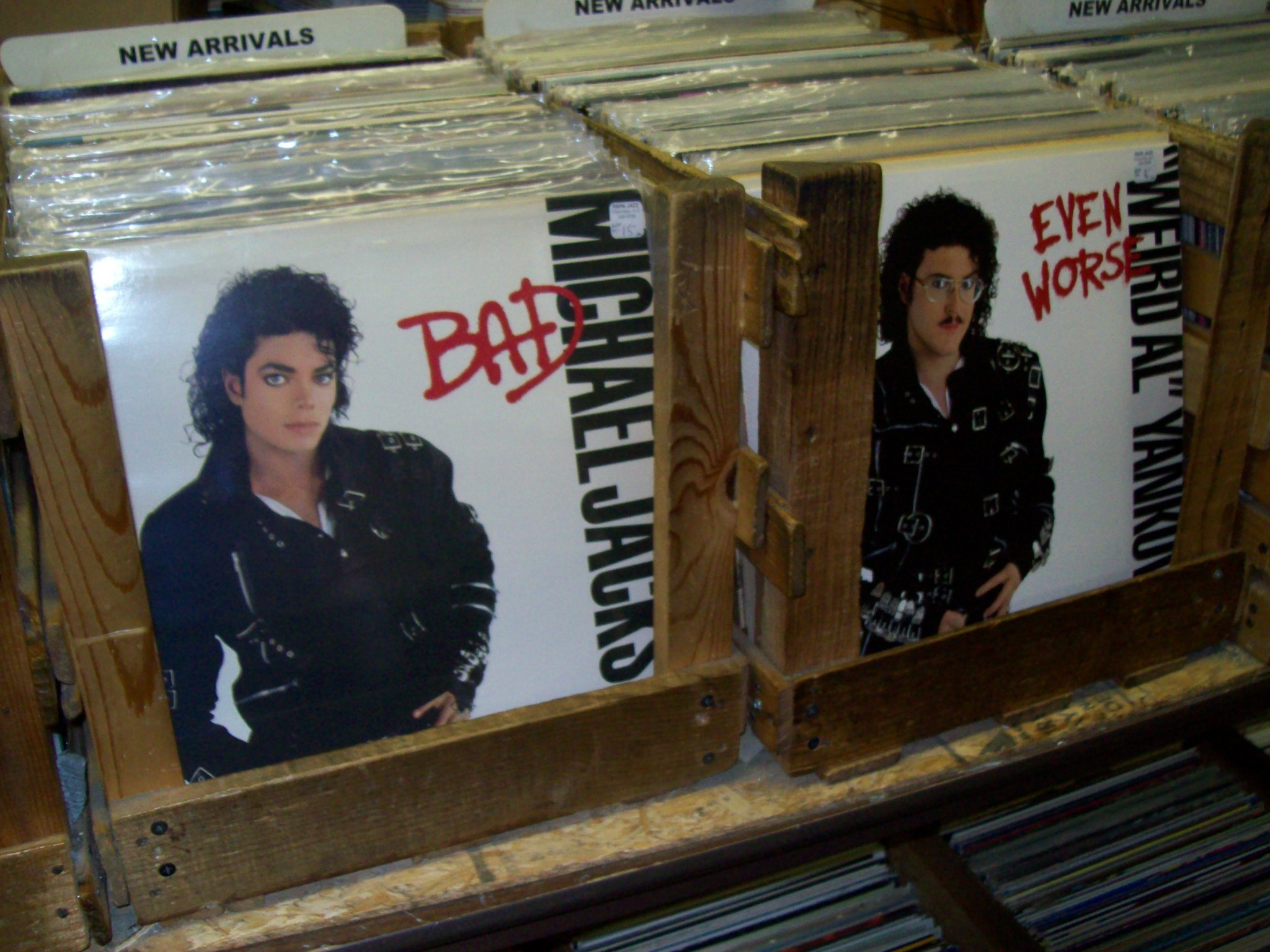 CD of Michael Jackson's BAD next to Weird Al Yankovic's EVEN WORSE