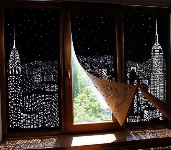 Cool window covers that look like night with the light of day being the stars or windows