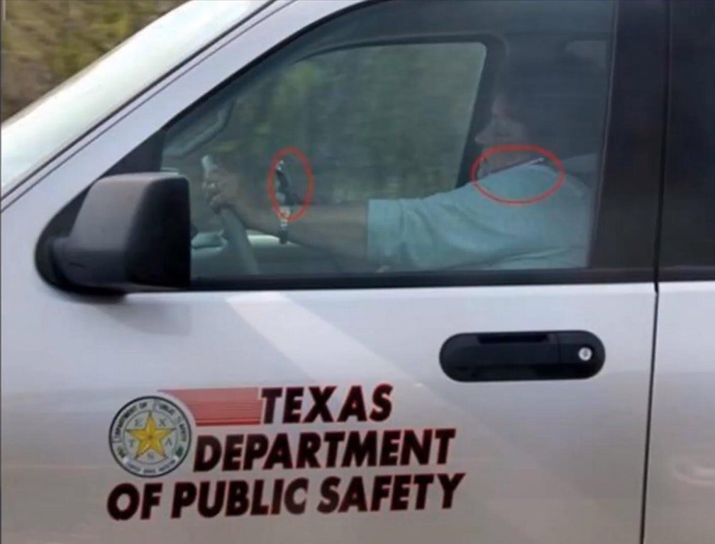 Texas Department of Public safety and driver is talking on a phone while texting with another.