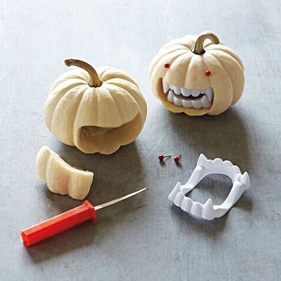 Funny pumpkin carved to make use of vampire teeth