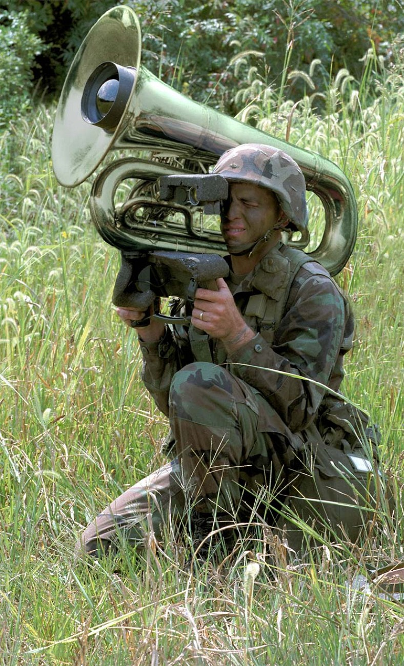 Hilarious photoshop of a bazooka rocket launcher and tuba being operated by a foot soldier