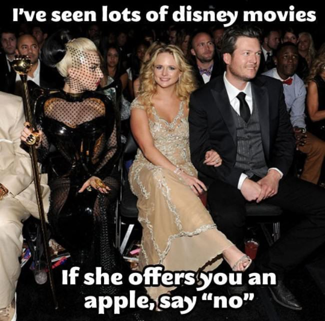 Lady Gaga sitting next to Blake Lively and joked that she is an evil step mother if you seen enough Disney movies.